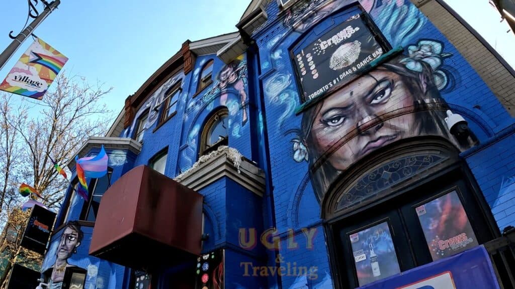 Vibrant mural on building in Toronto featuring colorful street art and creative urban culture.