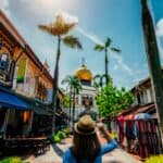 Colorful street market near Sultan Mosque in Singapore with traditional architecture and vibrant atmosphere.